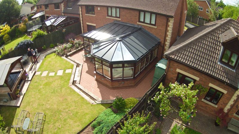 P-shaped conservatory with Solid Roofs Northamptonshire