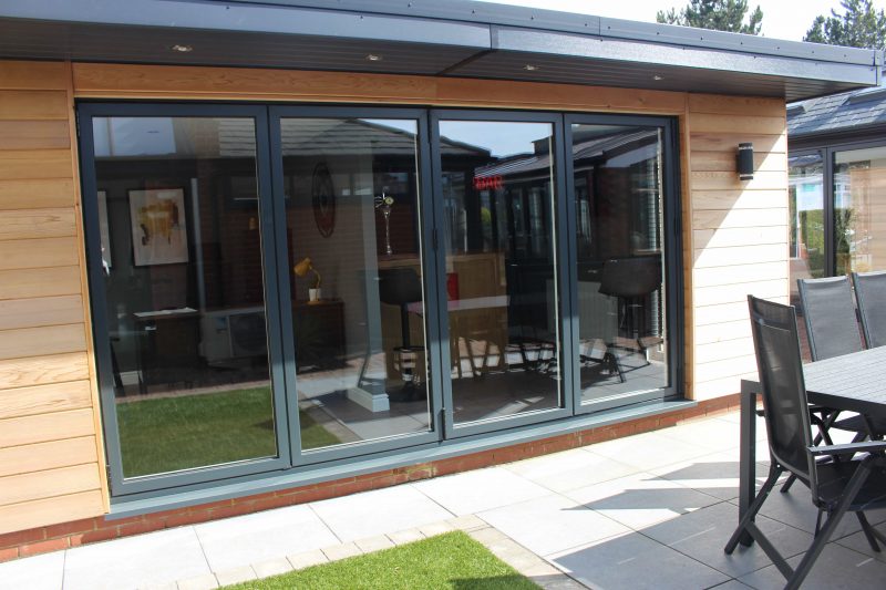 Cladded Garden Shed Room with Bifold Doors Northamptonshire