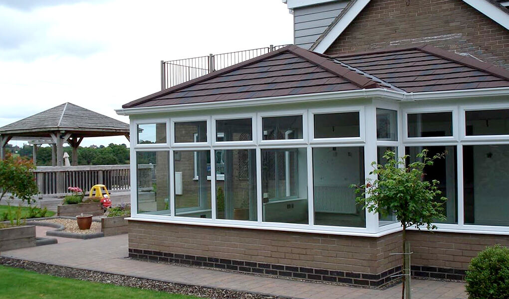 P-shaped conservatory with tiled roof Wellingborough
