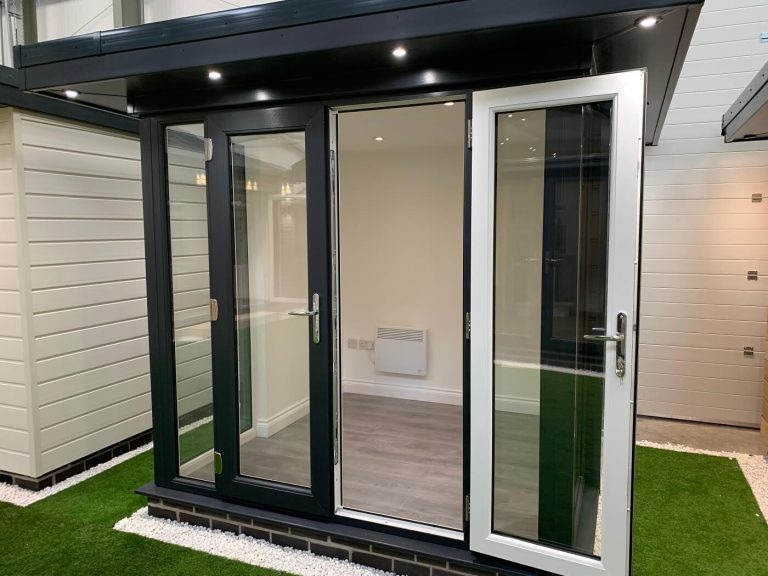 small garden room with full length glazed windows