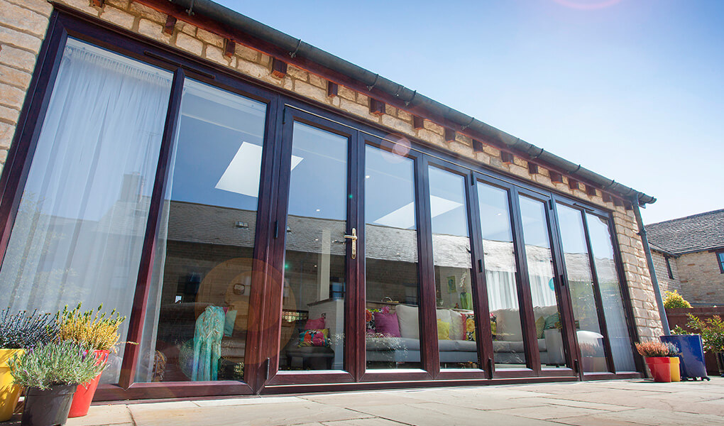 Closed uPVC rosewood bifold door