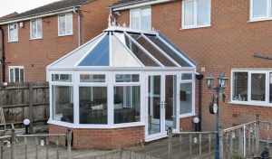 uPVC Victorian conservatory with a glass roof