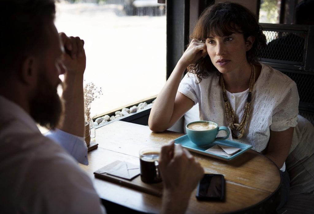 Two people talking